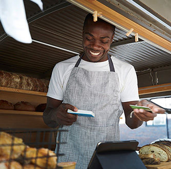 Smiling man bakery.