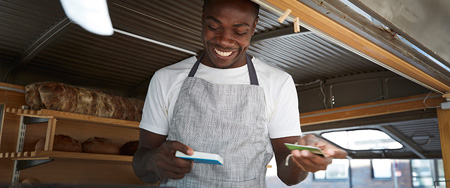 Smiling man bakery.