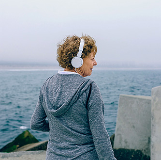 Senior woman headphone.